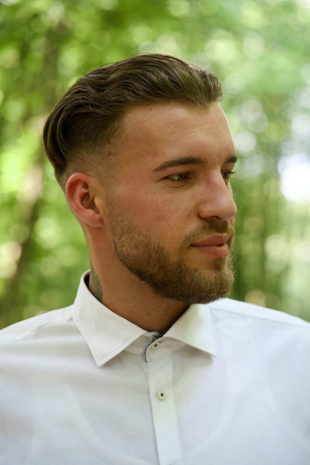 Portrait of a young Slovenian male JavaScript mentor with beard